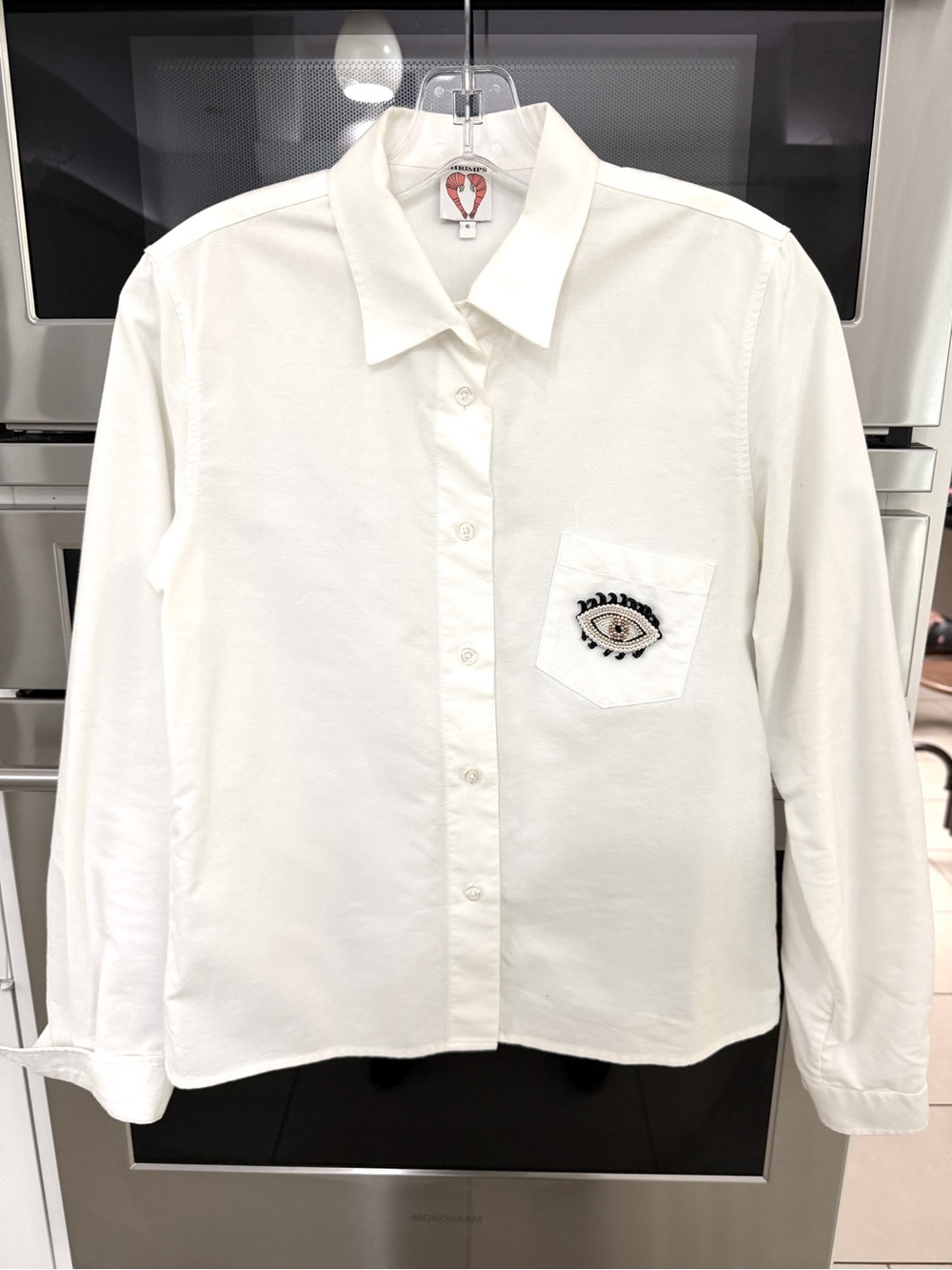Designer Shrimps: White Women’s Button-Up Shirt with Embroidered Pocket Eye